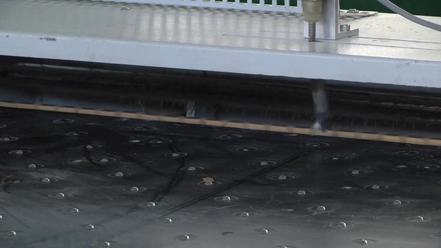 Detail of a wood chipboard after gluing and trimming the edges.