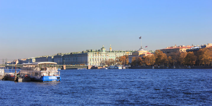 St. Petersburg Cityscape with Cruise Boat on Neva River Winter Palace Historic Architecture on Background. Image of Saint Petersburg, Second Largest City in Russia, Russian Major Travel Destination