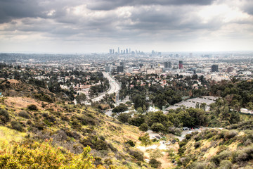 View over the green hills near Hollywood surrounding Los Angeles in the USA
