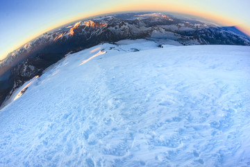 The main Caucasus range with mount Elbrus at dawn shot with a fisheye