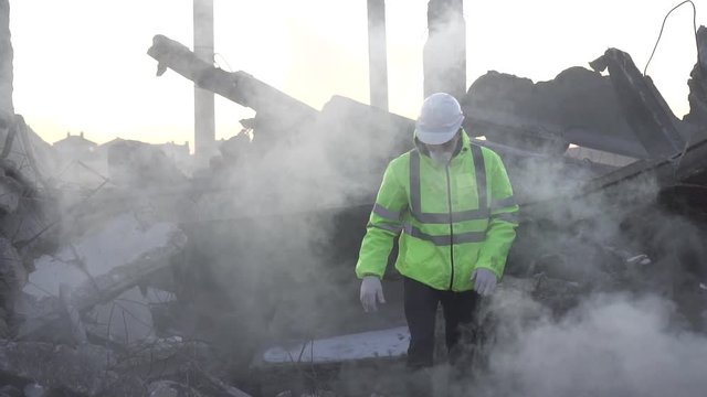 after the earthquake, a rescue worker is looking for missing people