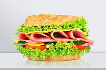 sandwich with ham, cheese and tomato isolated on white