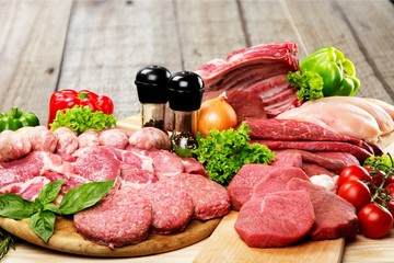 Fresh Raw Meat Background with vegetables