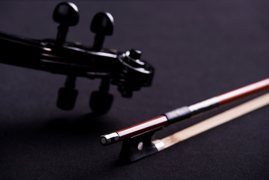 electronic violin on a black background