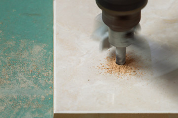 Construction work, tile cutting