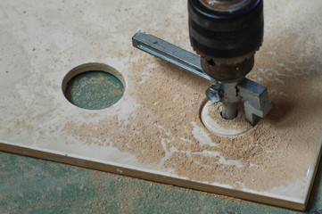 Laying tiles, repair work. Tile cutter