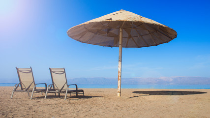 Sun loungers and umbrellas on the beach of Agios Ioannis village in Greece on Aug. 10, 2018