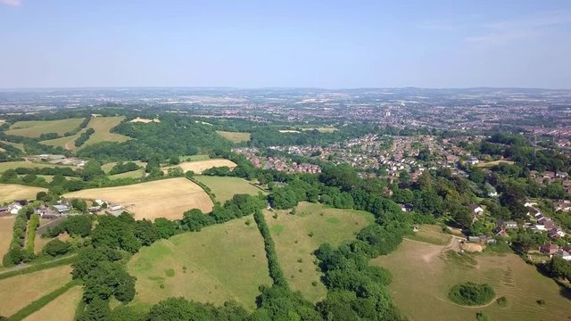 Exeter, England, Aerial drone footage flying from rural outskirts into city