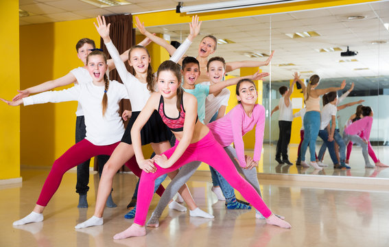 Tweens posing in dance school