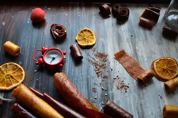 Pastila on a dark background, a composition of dried fruit.