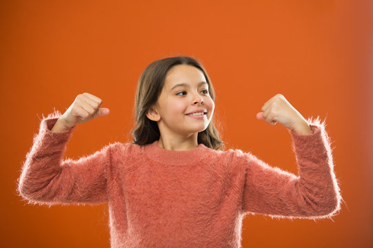 Golden rules for raising mentally strong kids. Child cute girl show biceps gesture of power and strength. Feel so powerful. Girls rules concept. Upbringing advices for girls. Strong and powerful