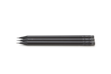 Set of three pencils with rubbers aligned on a white background