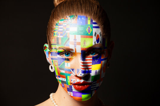 Portrait of woman with painted with Flags all countries of world