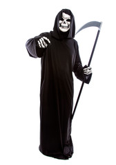 Halloween costume of a skeleton grim reaper wearing a black robe on a white background pointing...