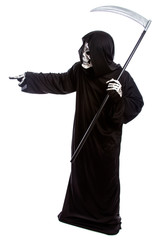 Halloween costume of a skeleton grim reaper wearing a black robe on a white background pointing...