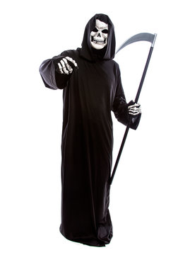 Halloween costume of a skeleton grim reaper wearing a black robe on a white background pointing forward