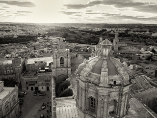 Aerial drone photo - St. Paul's Cathedral at sunset in the ancient medieval city of Mdina, Malta.