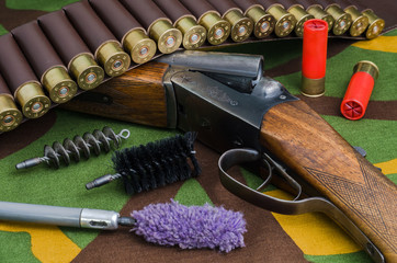 Hunting rifle with brushes for cleaning weapons