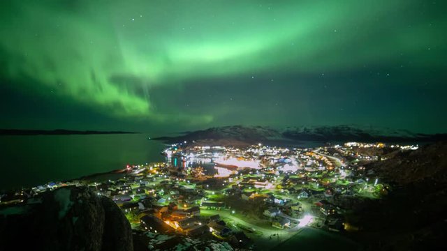 Timelape Northernlight aurora borealis over the town Qaqortoq Greenland 4k