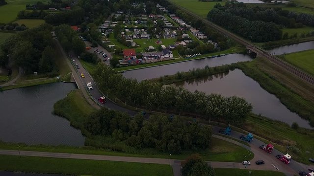 Truck parade with lots of trucks and trailers. Many transport companies participate in this parade.