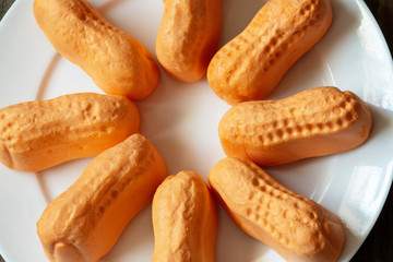 Closeup of orange circus peanuts, an old-fashioned candy.