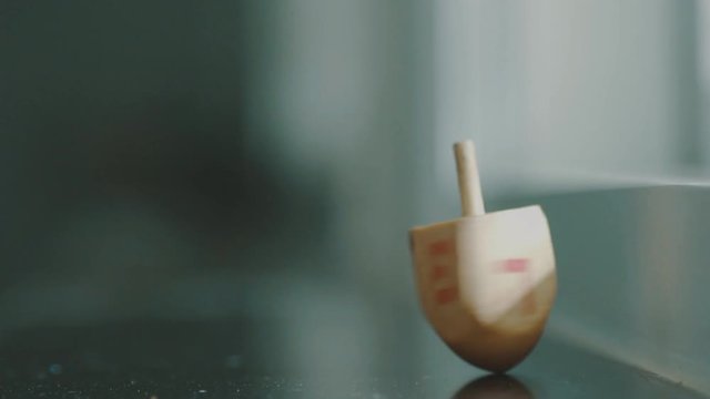 Spinning Dreidel on Chanukah. Slow Motion