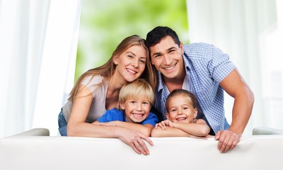 Beautiful smiling family on background