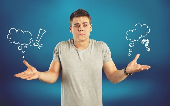 Confused, puzzled man with question