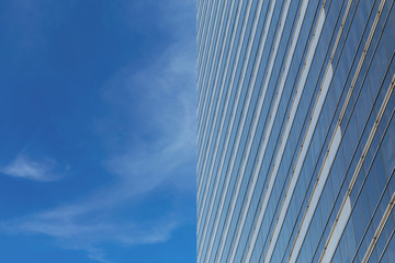 Fototapeta na wymiar Modern glass buildings office, Skyscraper with blue sky and cloudy
