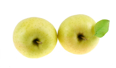 close up on golden delicious apples isolated on white background