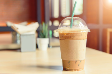 ice coffee on the table with sunlight