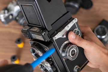 Performing cleaning of vintage photo camera