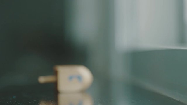 Spinning Dreidel on Chanukah