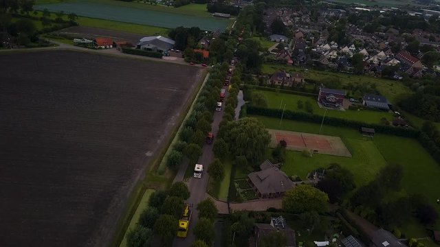 Truck parade with lots of trucks and trailers. Many transport companies participate in this parade.
