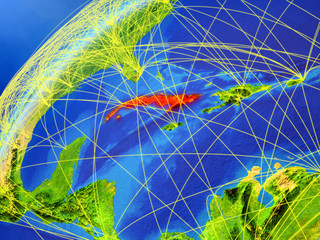 Cuba on model of planet Earth with international networks. Concept of digital communication and technology.