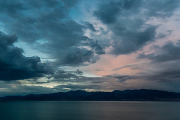 Majestic Clouds and Light Reflection in Water at Pyramid Lake, Nevada, USA at Dusk
