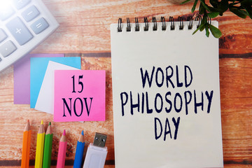 INTERNATIONAL EVENT CALENDAR CONCEPTUAL : WORLD PHILOSOPHY DAY  , 15 NOV with background of office stationeries.