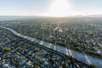 Sunset aerial view of Route 405 freeway crossing the San Fernando Valley in Los Angeles, California.