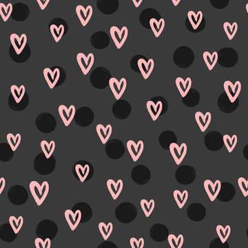 Romantic seamless pattern with round spots and hearts drawn by hand with rough brush. Sketch, watercolor, paint, ink.
