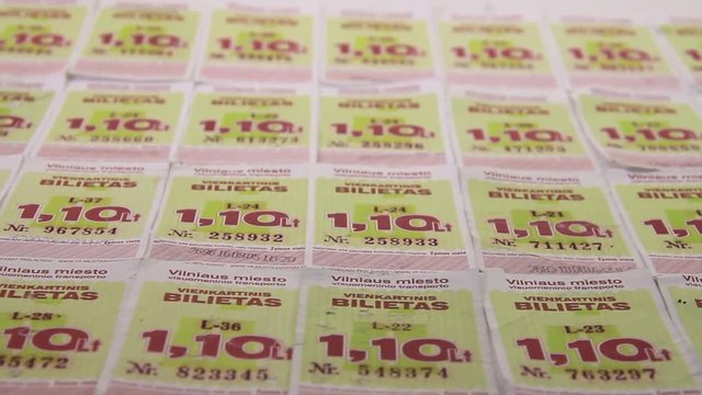 Rows of Vilnius Bus Ride a One-Time Tickets Purchased For The Old National Currency Litas. Close Up Footage.