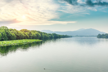Beautiful lake and mountain nature scenery at sunset