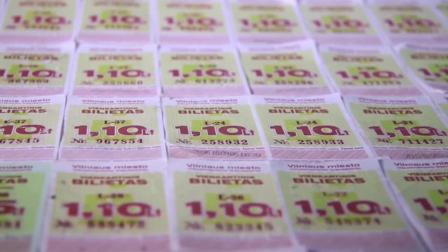 Rows of Vilnius Bus Ride a One-Time Tickets Purchased For The Old National Currency Litas. Close Up Footage.