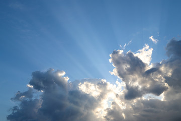 Dark blue sky and clouds with sunset light in the evening.