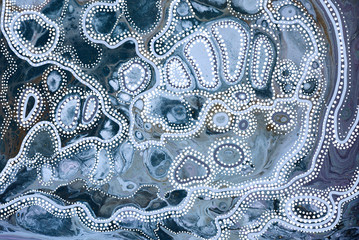 Marble abstract acrylic background. Blue marbling artwork texture. Agate ripple pattern with gold powder.