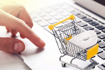 Shopping Cart with computer mouse and laptop