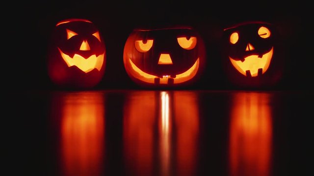 Three Pumpkins face Halloween party Background