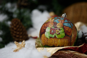 Christmas Decorations: Balls, fir branches, ribbons, straw toys and postcards
