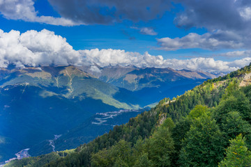 Mountain landscape against cloudy blue sky in Krasnaya Polyana Sochi