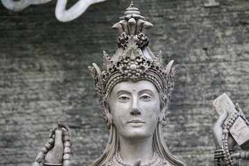 beautiful marble of women statue in traditional indonesian attire