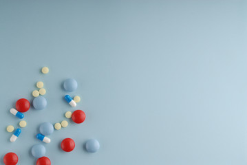 Drugs / medicine on blue